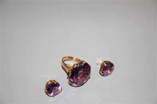 A modern 585 yellow metal and amethyst set dress ring, size M and a pair of similar 18k earrings.